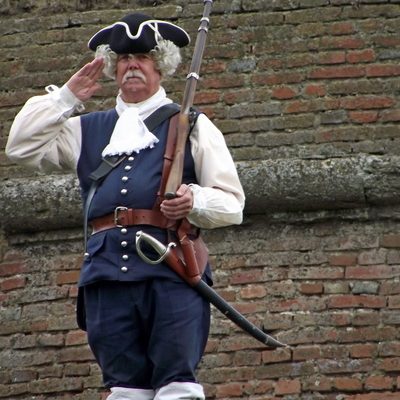 guard dressed in 18th century Austrian uniform in Alba Iulia